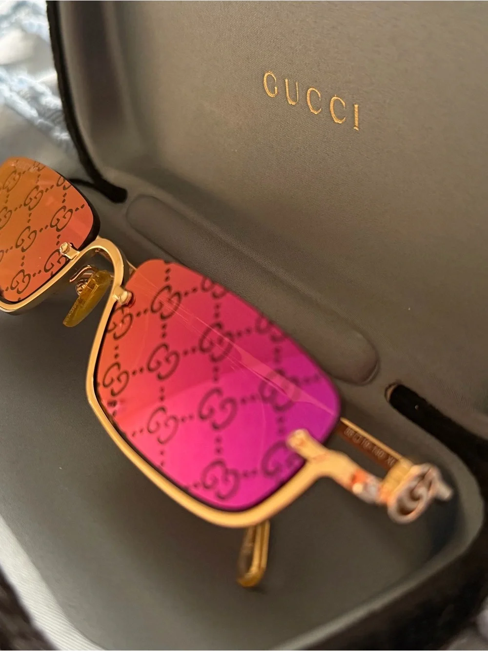 Gucci Gold Frame Sunglasses with Purple GG Logo Lenses